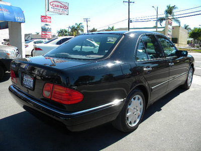 mercedes benz e class 1999 black sedan e320 gasoline 6 cylinders rear wheel drive automatic 92882