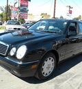 mercedes benz e class 1999 black sedan e320 gasoline 6 cylinders rear wheel drive automatic 92882