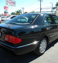 mercedes benz e class 1999 black sedan e320 gasoline 6 cylinders rear wheel drive automatic 92882