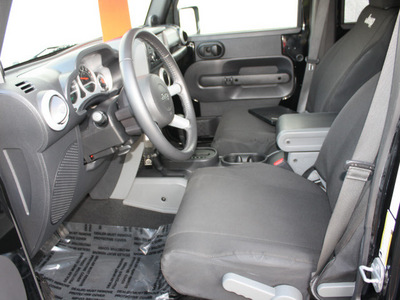 jeep wrangler unlimited 2009 black suv sahara gasoline 6 cylinders 4 wheel drive automatic 27616