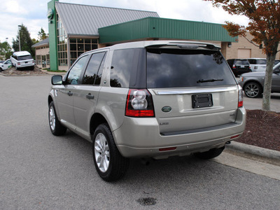 land rover lr2 2011 tan suv gasoline 6 cylinders all whee drive automatic 27511