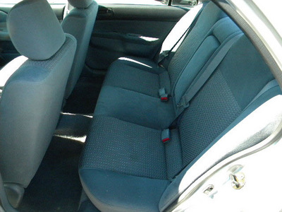 mitsubishi lancer 2003 silver sedan es gasoline 4 cylinders sohc front wheel drive automatic 92882