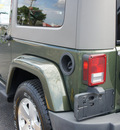 jeep wrangler 2008 green suv sahara gasoline 6 cylinders 4 wheel drive automatic 33021