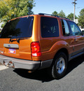 ford explorer sport 2001 gold suv gasoline 6 cylinders 4 wheel drive automatic with overdrive 80012