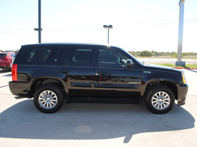 gmc yukon 2008 black suv hybrid hybrid 8 cylinders 4 wheel drive automatic 76087