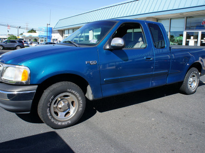 ford f 150 2001 blue xlt gasoline 6 cylinders rear wheel drive automatic with overdrive 08753
