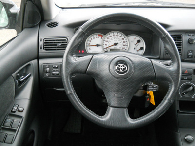 toyota corolla 2005 black sedan s gasoline 4 cylinders front wheel drive automatic with overdrive 55811