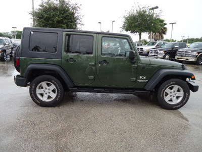 jeep wrangler unlimited 2008 green suv x gasoline 6 cylinders 2 wheel drive automatic 33157
