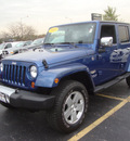 jeep wrangler unlimited 2010 blue suv sahara gasoline 6 cylinders 4 wheel drive automatic 60443