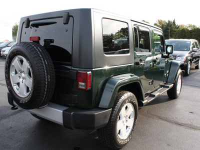 jeep wrangler unlimited 2010 green suv sahara gasoline 6 cylinders 4 wheel drive automatic with overdrive 07730