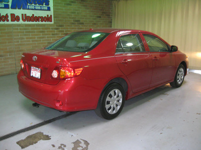 toyota corolla 2009 red sedan le gasoline 4 cylinders front wheel drive automatic 44883