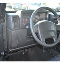 jeep wrangler 2004 black suv rubicon gasoline 6 cylinders 4 wheel drive automatic 98632