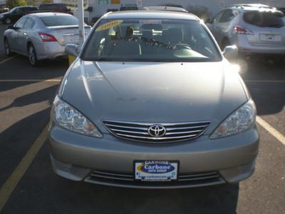 toyota camry 2006 green sedan gasoline 4 cylinders front wheel drive automatic with overdrive 13502