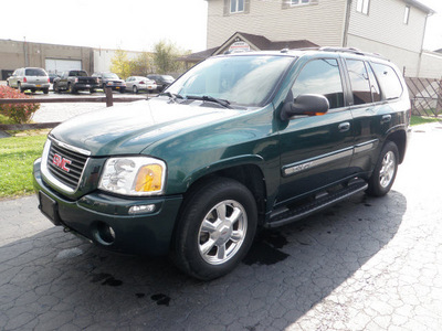 gmc envoy 2005 green suv slt gasoline 6 cylinders 4 wheel drive automatic 14224