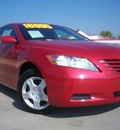 toyota camry 2009 red sedan le gasoline 4 cylinders front wheel drive automatic 90241