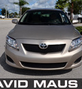 toyota corolla 2009 gold sedan le gasoline 4 cylinders front wheel drive automatic 32771