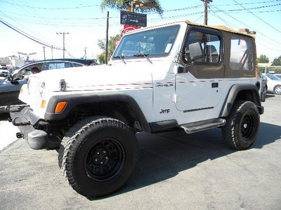 jeep wrangler 1997 white suv se gasoline 4 cylinders 4 wheel drive automatic 92882