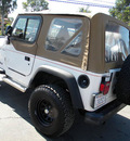 jeep wrangler 1997 white suv se gasoline 4 cylinders 4 wheel drive automatic 92882