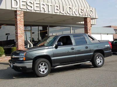 chevrolet avalanche 2006 green suv ls 1500 flex fuel 8 cylinders 4 wheel drive automatic 99336