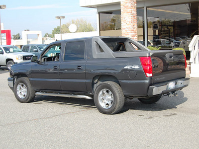 chevrolet avalanche 2006 green suv ls 1500 flex fuel 8 cylinders 4 wheel drive automatic 99336