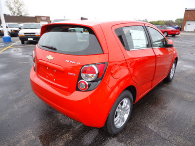 chevrolet sonic 2012 orange hatchback lt gasoline 4 cylinders front wheel drive 6 speed manual 60007