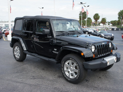 jeep wrangler unlimited 2011 black suv 70th anniversary gasoline 6 cylinders 4 wheel drive automatic 33021