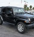 jeep wrangler unlimited 2011 black suv 70th anniversary gasoline 6 cylinders 4 wheel drive automatic 33021