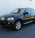 bmw x5 2010 black suv xdrive35d diesel 6 cylinders all whee drive automatic 27616