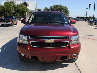 chevrolet tahoe 2009 red suv lt xfe flex fuel 8 cylinders 2 wheel drive automatic 76087