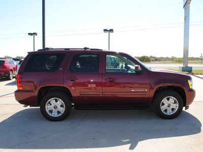 chevrolet tahoe 2009 red suv lt xfe flex fuel 8 cylinders 2 wheel drive automatic 76087