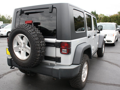 jeep wrangler unlimited 2009 silver suv rubicon gasoline 6 cylinders 4 wheel drive 6 speed manual 07730