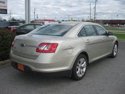 ford taurus 2010 gold sedan sel gasoline 6 cylinders front wheel drive automatic 62863