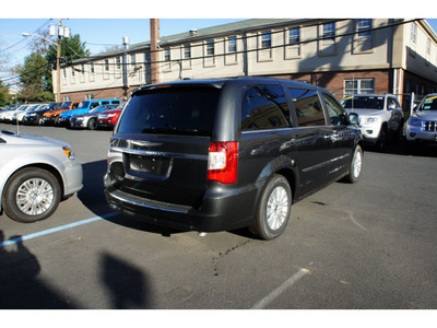 chrysler town and country 2011 black van touring l flex fuel 6 cylinders front wheel drive automatic with overdrive 08844