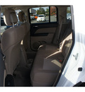 jeep patriot 2011 white suv latitude gasoline 4 cylinders 4 wheel drive automatic with overdrive 08844