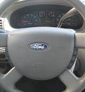ford taurus 2006 silver sedan se gasoline 6 cylinders front wheel drive automatic 33884