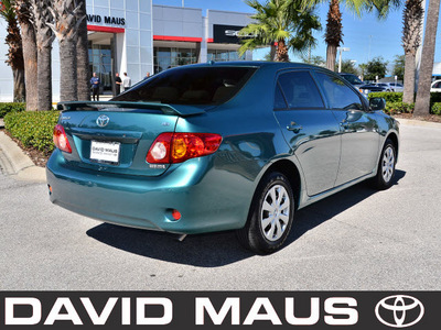 toyota corolla 2010 green sedan le gasoline 4 cylinders front wheel drive automatic 32771