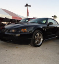 ford mustang 2004 black coupe gt deluxe gasoline 8 cylinders rear wheel drive automatic 33157