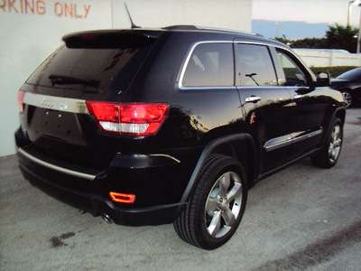 jeep grand cherokee 2012 black suv limited gasoline 8 cylinders 4 wheel drive automatic 33157