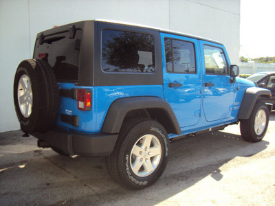 jeep wrangler unlimited 2011 blue suv sport gasoline 6 cylinders 4 wheel drive automatic 33157