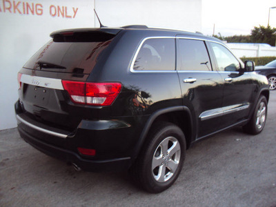jeep grand cherokee 2011 dk  gray suv limited gasoline 8 cylinders 4 wheel drive automatic 33157