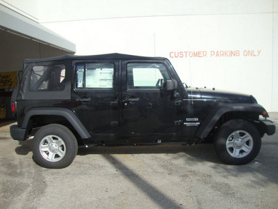 jeep wrangler unlimited 2012 black suv sport gasoline 6 cylinders 4 wheel drive automatic 33157