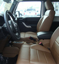 jeep wrangler 2011 silver suv sahara gasoline 6 cylinders 4 wheel drive automatic 33157