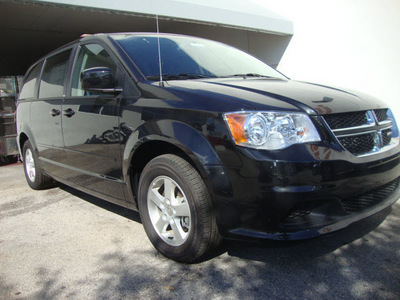 dodge grand caravan 2011 black van mainstreet flex fuel 6 cylinders front wheel drive automatic 33157