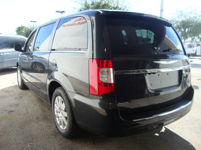 chrysler town and country 2012 black van touring l flex fuel 6 cylinders front wheel drive automatic 33157
