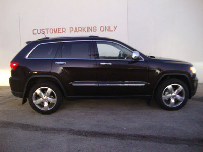 jeep grand cherokee 2011 dk  gray suv overland gasoline 6 cylinders 4 wheel drive automatic 33157