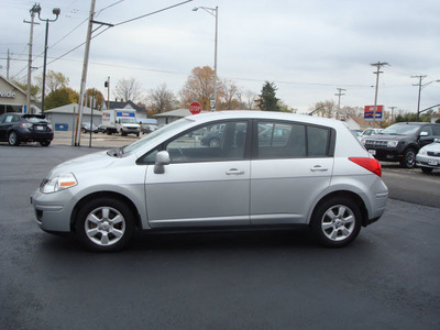 nissan versa 2008 silver hatchback 1 8 s gasoline 4 cylinders front wheel drive automatic 45324