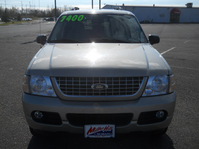 ford explorer 2004 gold suv xlt flex fuel 6 cylinders 4 wheel drive automatic with overdrive 55811