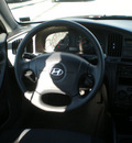 hyundai elantra 2006 black hatchback gasoline 4 cylinders front wheel drive automatic 13502