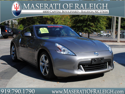 nissan 370z 2009 lt  gray coupe touring gasoline 6 cylinders rear wheel drive 6 speed manual 27616