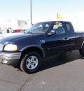 ford f 150 2003 blue pickup truck sc xlt fx4 gasoline 8 cylinders 4 wheel drive automatic with overdrive 56301
